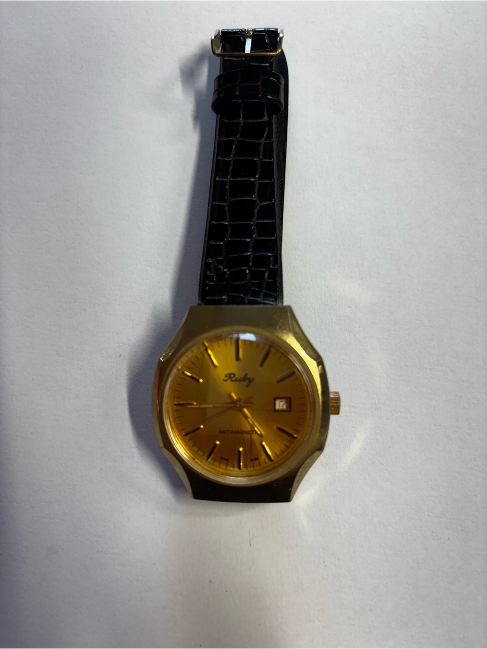 Gold-Tone Watch with Black Leather Strap